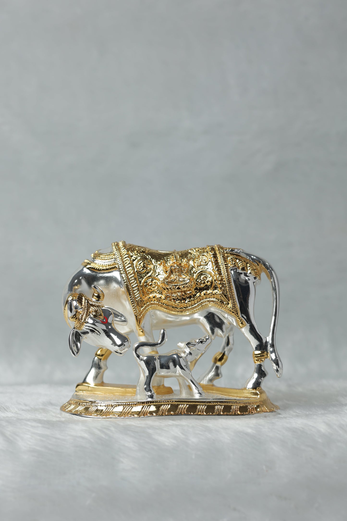 34 Gold and Silver plated Kamdhenu cow calf