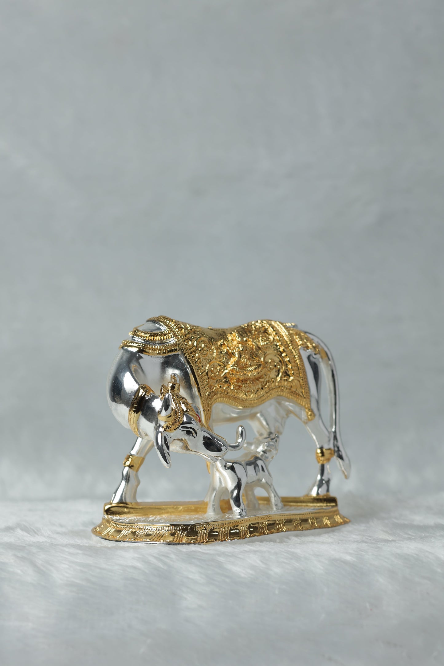 34 Gold and Silver plated Kamdhenu cow calf